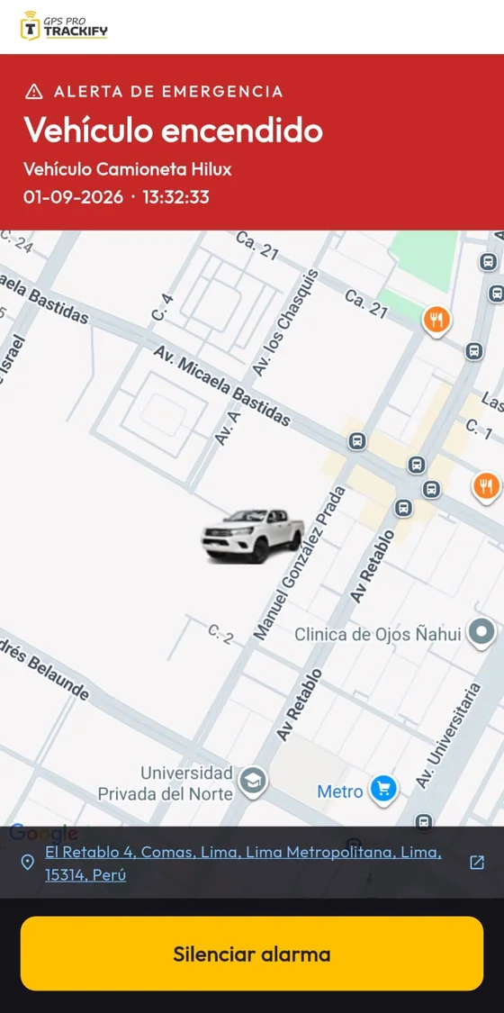 La alarma de emergencia de Trackify a pantalla completa: vehículo encendido, con la hora, el mapa de dónde está y el botón para silenciarla.